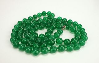 LONG STRAND OF GREEN JADE BEAD NECKLACE