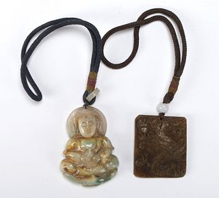 TWO CARVED JADE PENDANTS 
