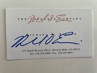 Former Disney CEO Michael Eisner signed business card