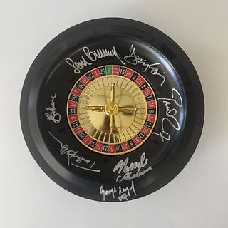 James Bond cast signed roulette wheel