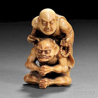 Ivory Carving of an Oni with a Priest