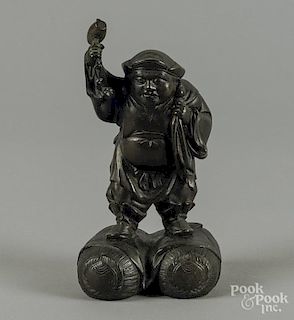 Japanese bronze figure of a man with hammer, 8'' h.