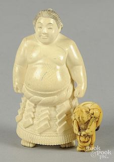 Japanese carved ivory sumo wrestler, ca. 1900, 4'' h., together with a netsuke, 1 1/2'' h.