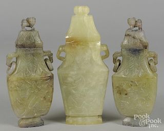 Three Chinese carved jadeite urns 9 3/4'' h, two - 9'' h.