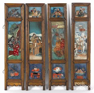 Chinese four-part hardwood folding screen, late 19th c., with reverse painted glass panels