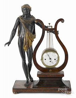 French Empire figural mantel clock, 19th c., with an ebonized classical figure