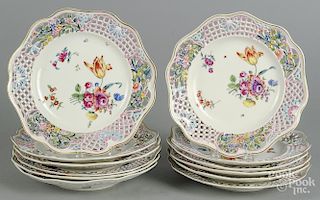 Set of twelve Herend painted porcelain reticulated plates, 10'' dia.