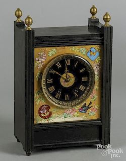 Slate mantel clock, late 19th c., with a painted porcelain bezel, 13'' x 8 1/4''.