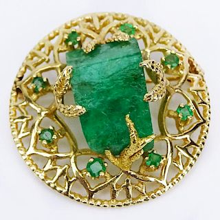 Vintage 14 Karat Yellow Gold and Large Natural Rough Emerald Pendant Brooch Further accented with eight round cut Emeralds
