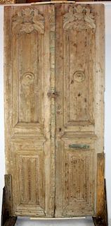 Pair of weathered & carved wood entry doors