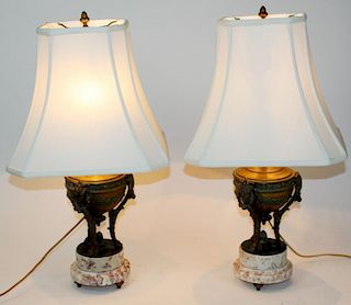 Pair of French urn form lamps on marble