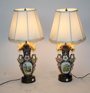 A pair of floral ceramic Rockingham lamps