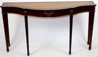 Maitland Smith mahogany console with leather top.