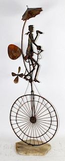 Jim Lewk copper sculpture of unicyclist