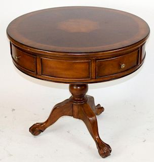 Drum table in mahogany on pedestal base.