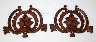 Pair of cast iron wall plaques