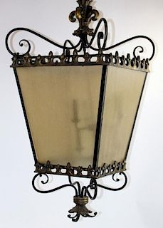 Iron lantern with stylized fleur de lys decoration