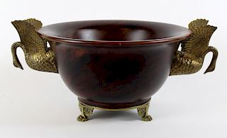 Turned wooden bowl with gilt bronze swans