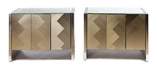 A Pair of Brushed Steel Veneered Side Cabinets Height 29 x width 39 1/2 x depth 21 1/4 inches.