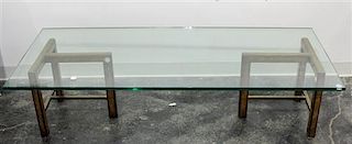 A Glass Topped Low Table Height 15 1/4 x width 60 x depth 26 inches.