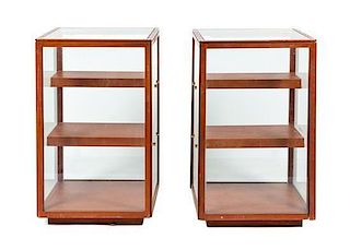 A Pair of Glass Display Cases Height 38 1/2 x width 23 3/4 x depth 23 3/4 inches.