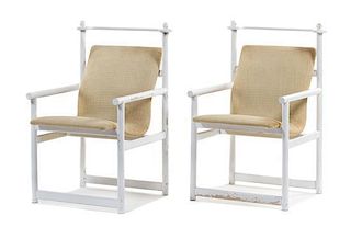 A Pair of Italian Arm Chairs Height 34 x width 21 1/2 x depth 20 inches.