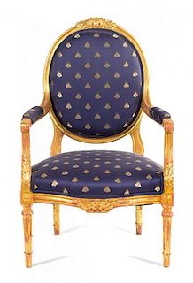 A Louis XVI Style Giltwood Bergere Height 39 inches.