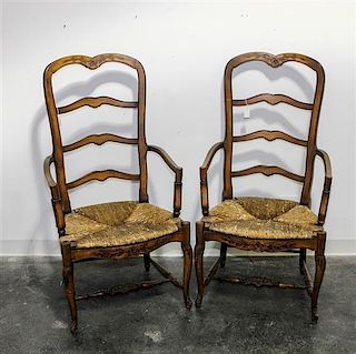 A Pair of Provincial Ladderback Side Chairs Height 44 3/4 inches.