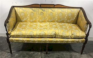 * A Sheraton Style Kittinger Settee, 2ND HALF 20TH CENTURY Height 36 1/4 x width 59 3/4 x depth 22 1/4 inches.