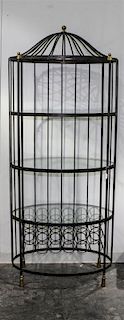 A Brass and Steel Etagere. Height 83 x width 34 3/4 x depth 29 1/2 inches.