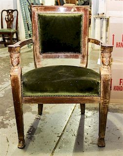 An Empire Style Parcel Gilt Fauteuil Height 38 1/4 inches.