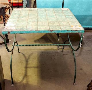 A French Tile Inset Wrought Iron Baker's Table Height 27 1/2 x width 29 1/2 x depth 29 1/2 inches.