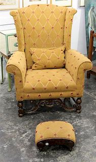 * A Jacobean Style Oak Wingback Chair Height 45 1/2 inches.