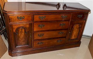 * A Chippendale Style Mahogany Chest of Drawers Height 34 x width 59 x depth 19 1/8 inches.