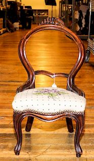 * A Victorian Mahogany Child's Chair. Height 24 inches.