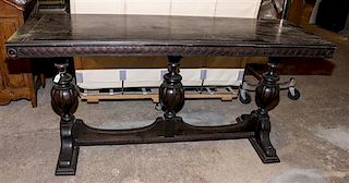 An American Renaissance Revival Library Table Height 29 x width 59 1/2 x depth 19 1/2 inches.