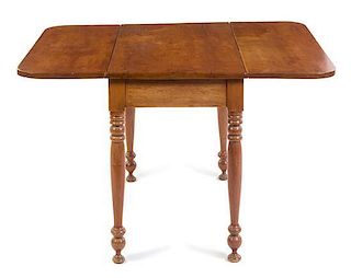 An American Maple Drop Leaf Table Height 28 1/2 x width 38 x depth 21 1/2 inches closed.