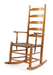 An American Ladder Back Rocking Chair Height 41 3/4 inches.