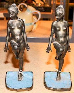 A Pair of Art Deco Cast Metal Figural Bookends Height 10 3/4 inches.