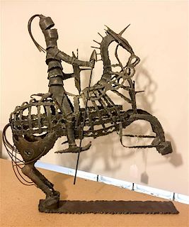 A Welded Steel Figure of a Knight. Width 20 inches.
