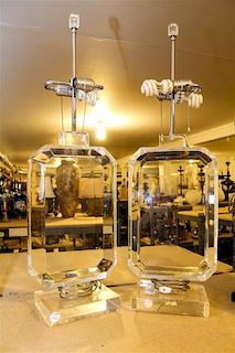 A Pair of Lucite Table Lamps Height 34 inches.
