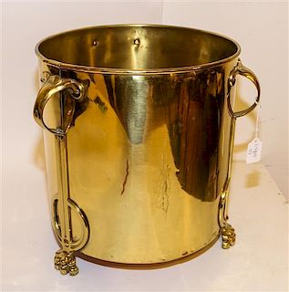 An Arts and Crafts Brass Jardiniere Height 13 1/2 inches.