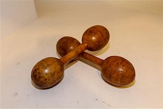 A Pair of Spalding Wood Hand Weights Length 10 1/4 inches.