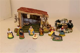 A French Painted Ceramic Nativity Scene Height of barn 6 inches.