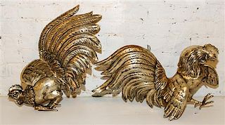 A Pair of Silvered Metal Fighting Roosters. Width of larger 24 inches.