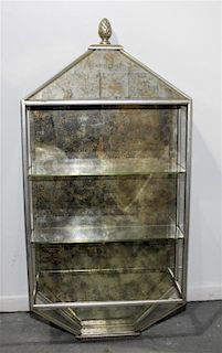 A Silvered and Gilt Decorated Hanging Vitrine Height 43 x width 21 x depth 6 3/4 inches.