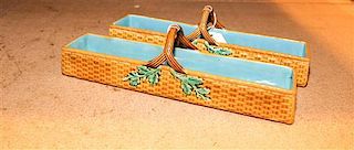* A Pair of Majolica Bread Baskets. Width 12 inches.