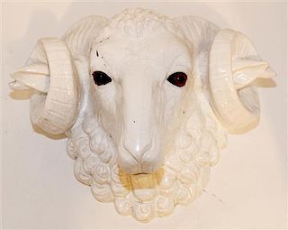 An Italian White Glazed Terra Cotta Ram's Head Butcher's Shop Emblem Width 17 1/2 inches.