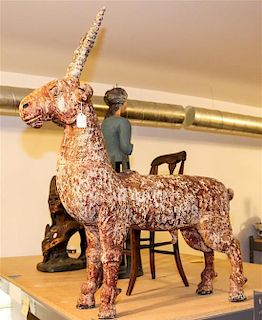 A Continental Painted Wood Animal Carving Height 38 inches.