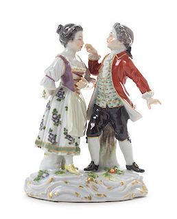 A Meissen Porcelain Figural Group Height 5 1/2 inches.